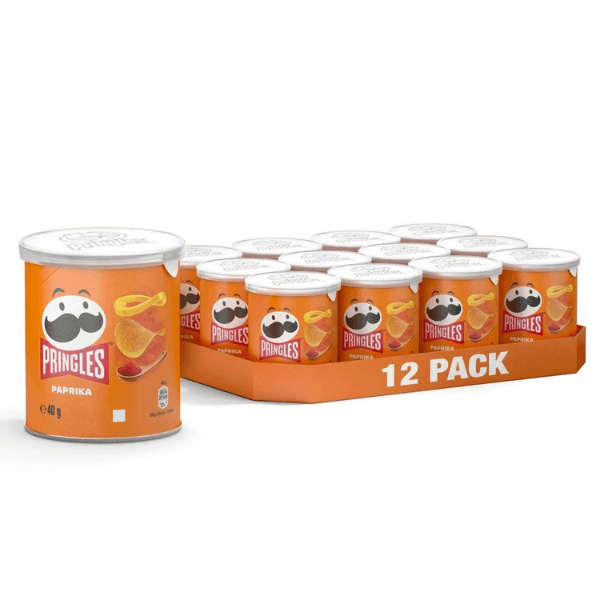 A tray of 12 Pringles Paprika tubs (40g each) is displayed, featuring vibrant orange packaging with the iconic Pringles logo and paprika chips pictured on every re-sealable tub.
