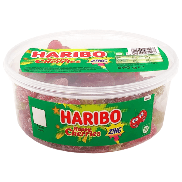 A clear plastic tub of Haribo Happy Cherries Zing by Haribo, featuring a green label with cartoon cherries and 75 pieces of red and green cherry-flavoured sour jellies inside.
