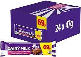 A box of Dairy Milk chocolate bar packs, 24 x 47g, in a purple packaging with a yellow price tag showing 69p, alongside a single wrapped Dairy Milk chocolate bar.