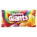 A single packet of Skittles Giants Fruits candy on a plain white background. The packaging features a vibrant rainbow design with the brand name 'Skittles' and product name 'Giants' in large white letters.