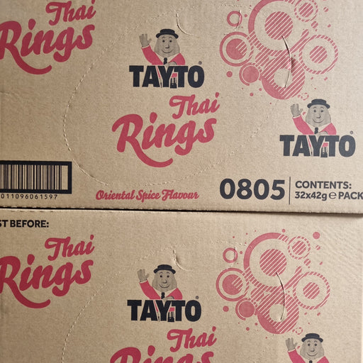 Cardboard boxes of Tayto Thai Rings, flavored with oriental spices, featuring colorful graphics and nutritional information on packaging.